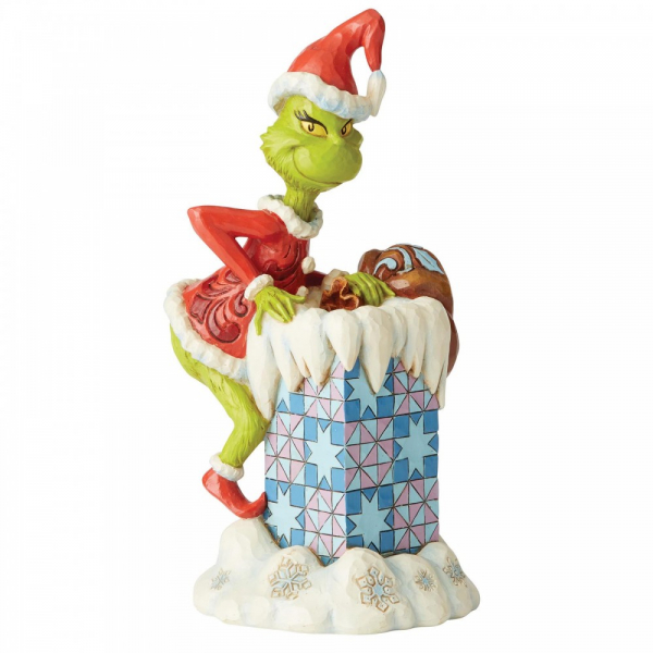 Grinch klimmend in Schoorsteen