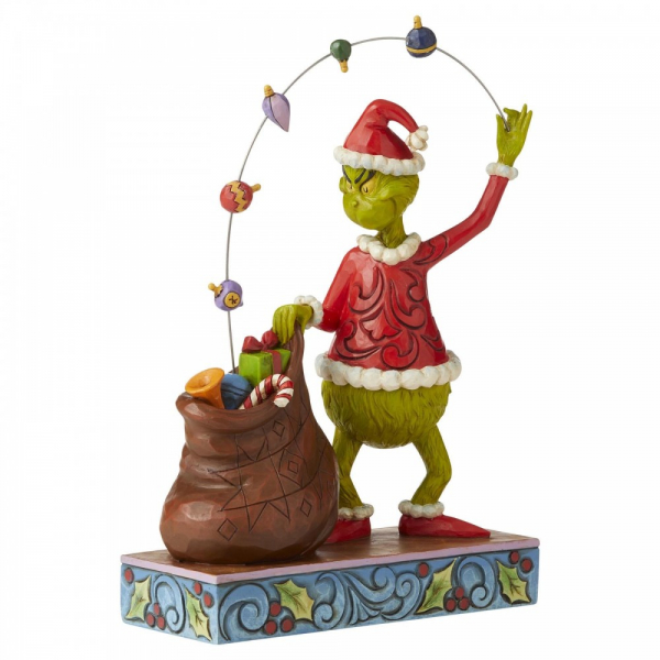 Grinch juggling ornaments